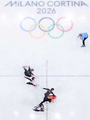 (260212) -- MILAN, Feb. 12, 2026 -- Sun Long (2nd from bottom) of China passes the finish line during the short track Speed skating, Eisschnelllauf men s 1000m final A at the Milan-Cortina 2026 Olympic Winter games, Winterspiele,Spiele, Summer games in Milan, Italy, Feb. 12, 2026. ) (MICO2026)ITALY-MILAN-OLYMPIC WINTER GAMES-SHORT TRACK SPEED SKATING-MEN S 1000M-FINALS ChenxYichen 