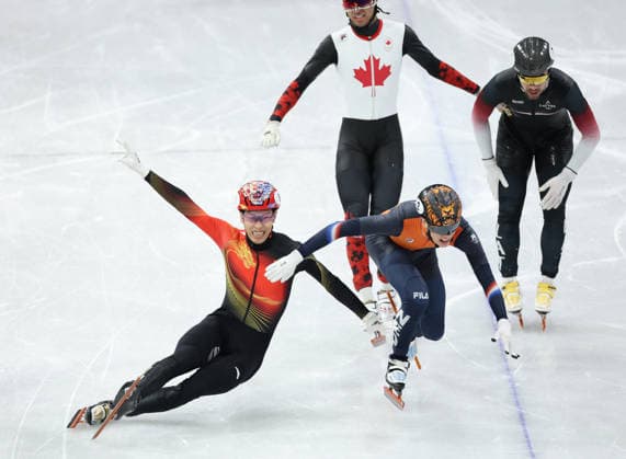 (260212) -- MILAN, Feb. 12, 2026 -- Sun Long (1st L) of China falls over after crossing the finish line during the short track Speed skating, Eisschnelllauf men s 1000m final A at the Milan-Cortina 2026 Olympic Winter games, Winterspiele,Spiele, Summer games in Milan, Italy, Feb. 12, 2026. ) (MICO2026)ITALY-MILAN-OLYMPIC WINTER GAMES-SHORT TRACK SPEED SKATING-MEN S 1000M-FINALS LixMing 