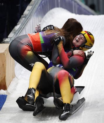 Members of Germany s Luge relay celebrate winning gold at the 2026 Winter Olympics in Cortina, Italy on Thursday February 12, 2026. The USA placed fourth.  OLY20260212653 HUGOxPHILPOTT