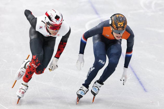 Winter Olympics - Short Track Speed skating, Eisschnelllauf Men s 1000m DANDJINOU William of Team Canada and Jens van t Wout of Team Netherlands compete during the Short Track Speed Skating Men s 1000m final on day six of the Milano Cortina 2026 Winter Olympic Games, Olympische Spiele, Olympia, OS at Milano Ice Skating Arena on February 12, 2026 in Milan, Italy. Photo by Alexis Jumeau ABACAPRESS.COM Milan Italy  Copyright: xJumeauxAlexis ABACAx