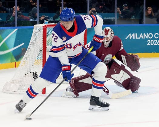 February 12, 2026, Milan, Lombardy, Italy: Tage Thompson 72 of Team United States and Elvis Merzlikins 30 of Team Latvia in men s Ice hockey, Eishockey group C play during the Milano Cortina 2026 Olympic Winter games, Winterspiele,Spiele, Summer games at Milano Santagiulia Ice Hockey Arena Olympics 2026: Milano Cortina: Ice Hockey Men - Group C - LAT-USA  - ZUMAm117 20260212_oly_m117_036 Copyright: xDavidxMcIntyrex