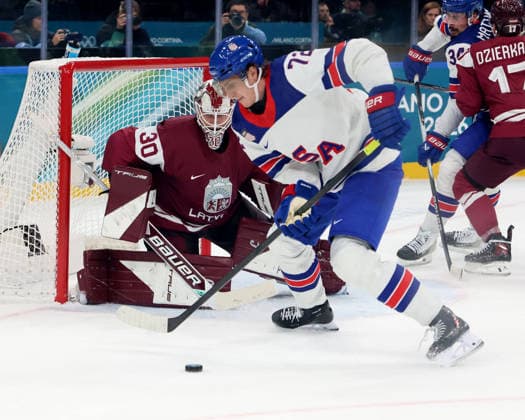 February 12, 2026, Milan, Lombardy, Italy: Tage Thompson 72 of Team United States and Elvis Merzlikins 30 of Team Latvia in men s Ice hockey, Eishockey group C play during the Milano Cortina 2026 Olympic Winter games, Winterspiele,Spiele, Summer games at Milano Santagiulia Ice Hockey Arena Olympics 2026: Milano Cortina: Ice Hockey Men - Group C - LAT-USA  - ZUMAm117 20260212_oly_m117_038 Copyright: xDavidxMcIntyrex