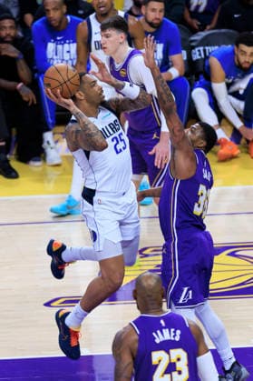 February 12, 2026, Los Angeles, California, USA: PJ Washington 25 of the Dallas Mavericks shoots a floater as Marcus Smart 36 of the Los Angeles Lakers defends the basket during their regular season NBA, Basketball Herren, USA game on Thursday February 12, 2026 at Crypto.com Arena in Los Angeles, California. ARIANA RUIZ PI Los Angeles USA - ZUMAp124 20260212_zaa_p124_058 Copyright: xArianaxRuizx