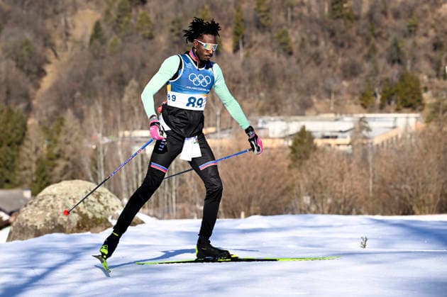 LKS 20260213 Stevenson Savart of Haiti warming before the men s Cross-Country Skiing 10km Interval Freestyle event at the Milano Cortina Winter Olympics at the Tesero Cross Country Skiing Stadium on February 13, 2026. - RONI REKOMAA Tesero Italy 6RXD3SWnTPM  Copyright: xRonixRekomaax 6RXD3SWnTPM