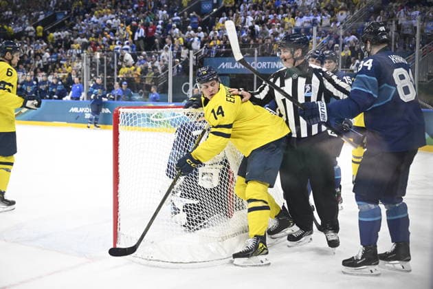 MILANO, ITALIEN 20260213 Sveriges Joel Eriksson Ek (14) och Finlands Kaapo Kakko (84) under ishockeymatchen i grupp B mellan Sverige och Finland i Santagiulia Arena under OS i Milano. *** Bilden ingar i SPORTPAKET. För övriga BETALBILD *** MILANO ITALIEN x10070x *** MILANO, ITALY 20260213 Swedens Joel Eriksson Ek 14 and Finlands Kaapo Kakko 84 during the Group B ice hockey match between Sweden and Finland at the Santagiulia Arena during the Milan Olympics Picture in SPORT PACKAGE For others PAY PICTURE MILANO ITALY x10070x  Copyright: xJessicaxGow TTx OS 2026 ISHOCKEY FINLAND-SVERIGE