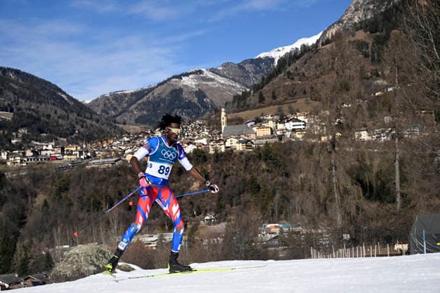 LKS 20260213 Stevenson Savart of Haiti competes during men s Cross-Country Skiing 10km Interval Freestyle event at the Milano Cortina Winter Olympics at the Tesero Cross Country Skiing Stadium on February 13, 2026. - MARKKU ULANDER Tesero Italy kGVag36zoWI  Copyright: xMarkkuxUlanderx kGVag36zoWI