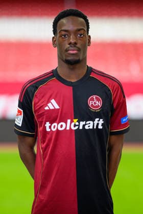 11.02.2026 - 1. FC Nürnberg FCN ( Club ) - 2. Fussball Bundesliga BL - Saison 2025 2026 - Fotomontage aus Portrait und Stadionhintergrund - Fototermin Porträttermin Vorstellung Präsentation Pressetermin - - Einzelbild Einzelfoto Portrait Porträt Kopfbild - Rabby Nzingoula (22, 1. FC Nürnberg FCN )
