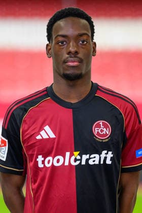 11.02.2026 - 1. FC Nürnberg FCN ( Club ) - 2. Fussball Bundesliga BL - Saison 2025 2026 - Fotomontage aus Portrait und Stadionhintergrund - Fototermin Porträttermin Vorstellung Präsentation Pressetermin - - Einzelbild Einzelfoto Portrait Porträt Kopfbild - Rabby Nzingoula (22, 1. FC Nürnberg FCN )