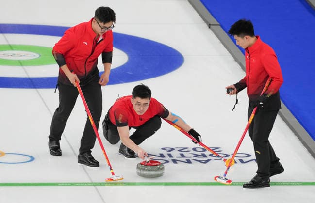 (260213) -- CORTINA D AMPEZZO, Feb. 13, 2026 -- Li Zhichao, Xu Jingtao and Fei Xueqing (from L to R) of China compete during the curling men round robin session 3 match between China and Norway at the Milan-Cortina 2026 Olympic Winter games, Winterspiele,Spiele, Summer games in Cortina, Italy, Feb. 13, 2026. ) (MICO2026)ITALY-CORTINA D AMPEZZO-OLYMPIC WINTER GAMES-CURLING-MEN-ROUND ROBIN-CHN VS NOR LixGang 