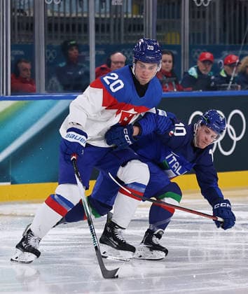 (260213) -- MILAN, Feb. 13, 2026 -- Juraj Slafkovsky (L) vies against Dustin Gazley of Italy during the Ice hockey, Eishockey men s preliminary round group B match between Italy and Slovakia at the Milan-Cortina 2026 Olympic Winter games, Winterspiele,Spiele, Summer games in Milan, Italy, Feb. 13, 2026. ) (MICO2026)ITALY-MILAN-OLYMPIC WINTER GAMES-ICE HOCKEY-MEN-PRELIMINARY-ITA VS SVK WangxKaiyan 