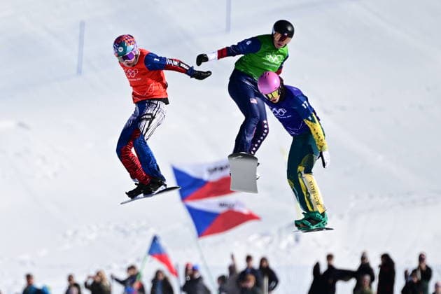 XXV Winter Olympic Games, Olympische Spiele, Olympia, OS in Livigno, Italy, on February 13, 2026. Snowboard Women s Snowboard Cross, 1 8 Finals. L-R Eva Adamczykova of Czech Republic, Brianna Schnorrbusch of USA and Josie Baff of Australia. (CTKxPhoto DavidxTanecek) CTKPhotoP2026021305172  CTKPhotoP2026021305172