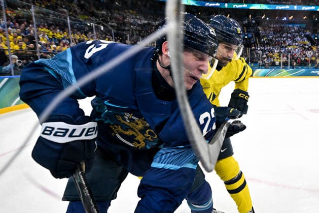 MILAN, ITALY - FEBRUARY 13: Esa Lindell of Finland and Filip Forsberg of Sweden in a battle along the boards during the Men™s Prelim Round match between Finland and Sweden on day seven of the Milano Cortina 2026 Winter Olympic Games, Olympische Spiele, Olympia, OS at Milano Santagiulia IHO Arena on February 13, 2026 in Milan, Italy. Milan Milano Santagiulia IHO Arena Italy *** MILAN, ITALY FEBRUARY 13 Esa Lindell of Finland and Filip Forsberg of Sweden in a battle along the boards during the Men™s Prelim Round match between Finland and Sweden on day seven of the Milano Cortina 2026 Winter Olympic games at Milano Santagiulia IHO Arena on February 13, 2026 in Milan, Italy Milan Milano Santagiulia IHO Arena Italy Copyright: xJustPictures.ch AndreaxBrancax jp-en-EuSpIm-AB-DSC_021813022026