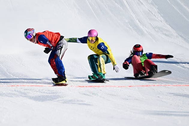 XXV Winter Olympic Games, Olympische Spiele, Olympia, OS in Livigno, Italy, on February 13, 2026. Snowboard Women s Snowboard Cross,Quarterfinals. L-R Eva Adamczykova of Czech Republic, Josie Baff of Australia and Sina Siegenthaler of Switzerland. (CTKxPhoto DavidxTanecek) CTKPhotoP2026021305505  CTKPhotoP2026021305505