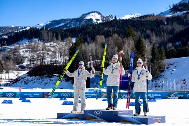 OLYMPICS - Winter Olympic Games, Olympische Spiele, Olympia, OS Milano Cortina 2026 TESERO,ITALY,13.FEB.26 - OLYMPICS, NORDIC SKIING, CROSS COUNTRY SKIING - Winter Olympic Games Milano Cortina 2026, 10km men, interval start free, medal ceremony. Image shows Mathis Desloges (FRA), Johannes Hoesflot Klaebo and Einar Hedegart (NOR).  GEPAxpictures xMatthiasxTrinkl