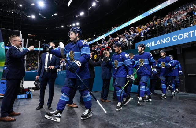 (260213) -- MILAN, Feb. 13, 2026 -- Players of Finland enter the court before the Ice hockey, Eishockey men s preliminary round group B match between Finland and Sweden at the Milan-Cortina 2026 Olympic Winter games, Winterspiele,Spiele, Summer games in Milan, Italy, Feb. 13, 2026. ) (MICO2026)ITALY-MILAN-OLYMPIC WINTER GAMES-ICE HOCKEY-MEN-PRELIMINARY-FIN VS SWE TaoxXiyi 