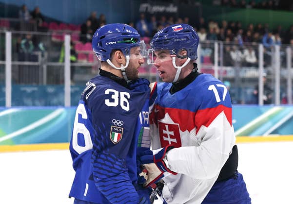 (260213) -- MILAN, Feb. 13, 2026 -- Cristiano Digiacinto (L) of Italy fights with Simon Nemec of Slovakia during the Ice hockey, Eishockey men s preliminary round group B match between Italy and Slovakia at the Milan-Cortina 2026 Olympic Winter games, Winterspiele,Spiele, Summer games in Milan, Italy, Feb. 13, 2026. ) (MICO2026)ITALY-MILAN-OLYMPIC WINTER GAMES-ICE HOCKEY-MEN-PRELIMINARY-ITA VS SVK WangxKaiyan 