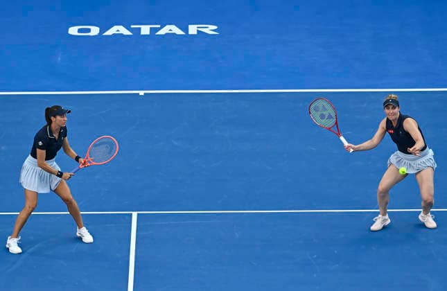 WTA, Tennis Damen QATAR OPEN 2026-DOUBLES SEMIFINAL Gabriela Dabrowski (R) of Canada and Luisa Stefani of Brazil seen in action during their Women s doubles semifinal match against Anna Danilina of Kazakhstan and Aleksandra Krunic of Serbia (not in view) at the WTA Qatar TotalEnergies Open 2026 tennis tournament at the Khalifa International Tennis Complex in Doha, Qatar, on February 13, 2026. ¨¨ DOHA Qatar Copyright: xNOUSHADx