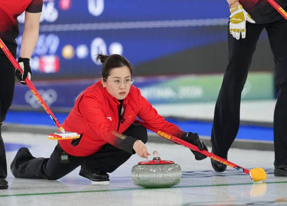 (260213) -- CORTINA D AMPEZZO, Feb. 13, 2026 -- Wang Rui of China competes during the curling women round robin session 3 match between China and Switzerland at the 2026 Milan-Cortina Winter Olympics in Cortina D Ampezzo, Italy, Feb. 13, 2026. ) (MICO2026)ITALY-CORTINA D AMPEZZO-OLYMPIC Winter games, Winterspiele,Spiele, Summer games CURLING-WOMEN-ROUND ROBIN-CHN VS SUI LixGang 