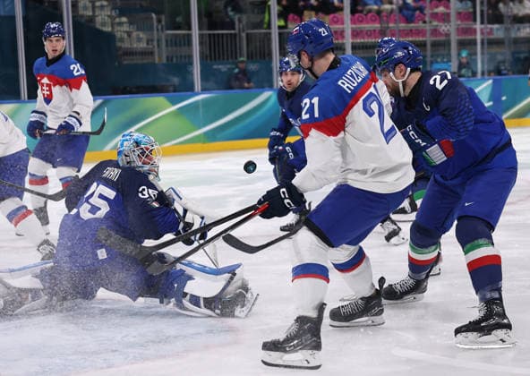 (260213) -- MILAN, Feb. 13, 2026 -- Davide Fadani (2nd L), goalkeeper of Italy, makes a save during the Ice hockey, Eishockey men s preliminary round group B match between Italy and Slovakia at the Milan-Cortina 2026 Olympic Winter games, Winterspiele,Spiele, Summer games in Milan, Italy, Feb. 13, 2026. ) (MICO2026)ITALY-MILAN-OLYMPIC WINTER GAMES-ICE HOCKEY-MEN-PRELIMINARY-ITA VS SVK WangxKaiyan 