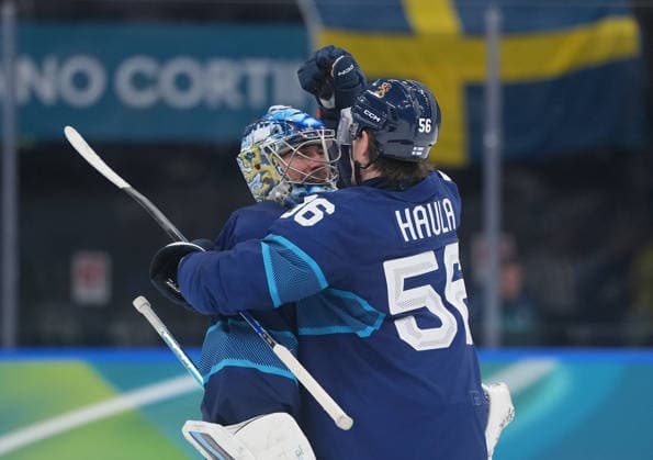 (260213) -- MILAN, Feb. 13, 2026 -- Erik Haula (R) of Finland celebrates with teammate Juuse Saros during the Ice hockey, Eishockey men s preliminary round group B match between Finland and Sweden at the Milan-Cortina 2026 Olympic Winter games, Winterspiele,Spiele, Summer games in Milan, Italy, Feb. 13, 2026. ) (MICO2026)ITALY-MILAN-OLYMPIC WINTER GAMES-ICE HOCKEY-MEN-PRELIMINARY-FIN VS SWE TaoxXiyi 