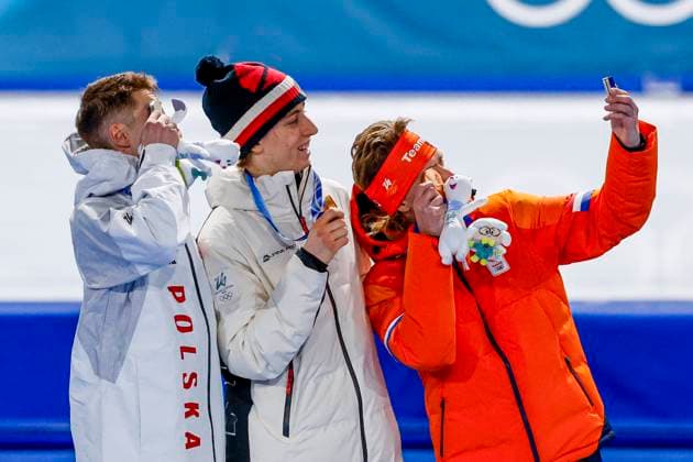 second Vladimir Semirunniy of Poland and winner Metodej Jilek of Czechia and third Jorrit Bergsma of the Netherlands smiling during the medal ceremony after Men s 10000m, Milano Cortina 2026 Winter Olympics: Day 7, Speed skating, Eisschnelllauf - Milano Cortina 2026 Winter Olympics: Day 7, Milano Speed Skating Stadium, February 13, 2026, Milan, Italy.