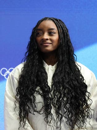 February 13, 2026, Milan, Lombardy, Italy: Artistic Gymnastics legends SIMONE BILES of USA attends the Free Skating program in the Men Single Skating of the Figure skating, Eiskunstlauf at the Milano Cortina 2026 Winter Olympic Games, Olympische Spiele, Olympia, OS Milan Italy - ZUMAc179 20260213_oly_c179_224 Copyright: xMickaelxChavetx