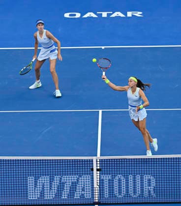 February 13, 2026, Doha, Qatar: Anna Danilina of Kazakhstan and Aleksandra Krunic of Serbia seen in action during their Women s doubles semifinal match against Gabriela Dabrowski of Canada and Luisa Stefani of Brazil (not in view) at the WTA, Tennis Damen Qatar TotalEnergies Open 2026 tennis tournament at the Khalifa International Tennis Complex. Anna Danilina Aleksandra Krunic won against Gabriela Dabrowski Luisa Stefani. 6-3,6-4. WTA Qatar TotalEnergies Open 2026-Doubles Semifinal In Doha - 13 Feb 2026  - ZUMAs197 20260213_aaa_s197_235 Copyright: xNoushadxVariyattiyakkalx