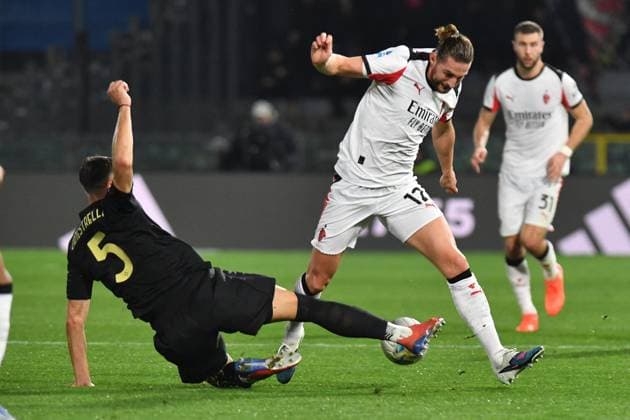 CALCIO - Serie A - Pisa SC vs AC Milan Simone Canestrelli (Pisa) Adrien Rabiot (Milan) during Pisa SC vs AC Milan, Italian soccer Serie A match in Pisa, Italy, February 13 2026 Pisa Italy  Copyright: xIPAxSport ABACAx