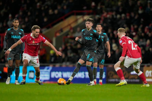 13th February 2026; SToK Cae Ras Stadium, Wrexham, Wales; FA Cup Football, Wrexham versus Ipswich Town; Dan Neil of Ipswich Town passes the ball  StevexFlynn