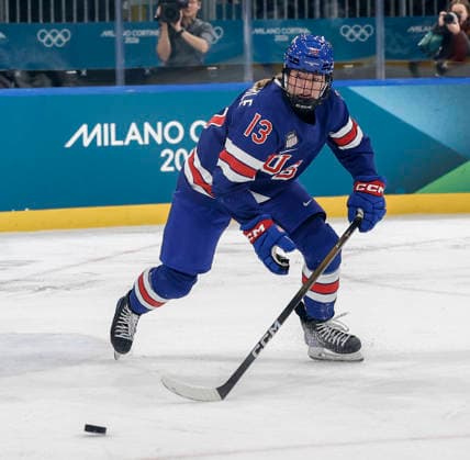 United States Grace Zumwinkle (13) chases a rebound in the second period of the Women s Playoff Quarterfinal game between Italy and the USA at the Milano Rho Ice hockey, Eishockey Arena in Milan, Italy, on Friday, February 13, 2026.  OLY202602138619 AARONxJOSEFCZYK