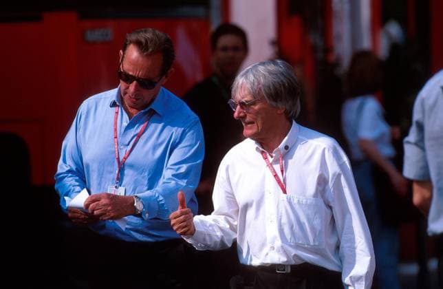 Bernie Ecclestone (GBR) F1 Supremo with Paddy Mcnally (GBR) in the paddock...Spanish Grand Prix, Rd5, Barcelona, Spain, 7 May 2000. Copyright: xSuttonxMotorsportsx