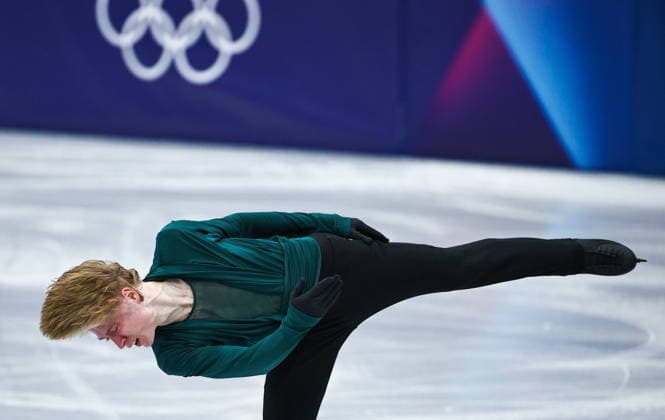 ITALY, MILAN - FEBRUARY 13, 2026: Figure skater Stephen Gogolev of Canada performs during the men s free skating event at the 2026 Winter Olympic Games, Olympische Spiele, Olympia, OS at Milano Ice Skating Arena. Mikhail Tereshchenko TASS  88658431