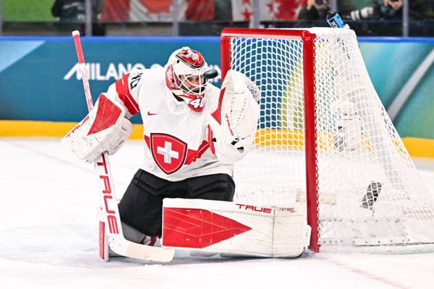 MILAN, ITALY - FEBRUARY 13: Akira Schmid of Switzerland makes a save during the Men™s Prelim Round match between Canada and Switzerland on day seven of the Milano Cortina 2026 Winter Olympic Games, Olympische Spiele, Olympia, OS at Milano Santagiulia IHO Arena on February 13, 2026 in Milan, Italy. Milan Milano Santagiulia IHO Arena Italy *** MILAN, ITALY FEBRUARY 13 Akira Schmid of Switzerland makes a save during the Men™s Prelim Round match between Canada and Switzerland on day seven of the Milano Cortina 2026 Winter Olympic games at Milano Santagiulia IHO Arena on February 13, 2026 in Milan, Italy Milan Milano Santagiulia IHO Arena Italy Copyright: xJustPictures.ch AndreaxBrancax jp-en-EuSpIm-AB-AAB_613613022026