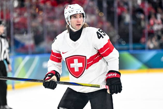 MILAN, ITALY - FEBRUARY 13: Michael Fora of Switzerland in action during the Men™s Prelim Round match between Canada and Switzerland on day seven of the Milano Cortina 2026 Winter Olympic Games, Olympische Spiele, Olympia, OS at Milano Santagiulia IHO Arena on February 13, 2026 in Milan, Italy. Milan Milano Santagiulia IHO Arena Italy *** MILAN, ITALY FEBRUARY 13 Michael Fora of Switzerland in action during the Men™s Prelim Round match between Canada and Switzerland on day seven of the Milano Cortina 2026 Winter Olympic games at Milano Santagiulia IHO Arena on February 13, 2026 in Milan, Italy Milan Milano Santagiulia IHO Arena Italy Copyright: xJustPictures.ch AndreaxBrancax jp-en-EuSpIm-AB-AAB_585413022026