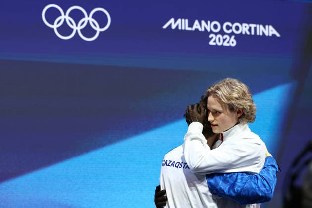 February 13, 2026, Milan, Lombardy, Italy: Favourite but falling out of the podium ILIA MALININ of USA congratulates the winner MIKHAIL SHAIDOROV of Kazakhstan in the Men Single Skating of the Figure skating, Eiskunstlauf at the Milano Cortina 2026 Winter Olympic Games, Olympische Spiele, Olympia, OS Olympics 2026: Milano Cortina: Figure Skating Men Single Skating  - ZUMAc179 20260213_oly_c179_261 Copyright: xMickaelxChavetx