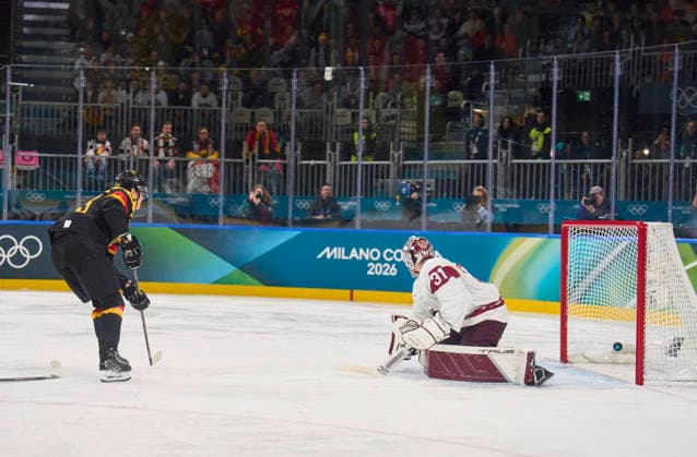 Lukas Reichel of Germany scores for 1-0 at the preliminary men Ice hockey, Eishockey match Group C Germany - Latvia of the Milano Cortina 2026 Winter Olympic Games, Olympische Spiele, Olympia, OS at Milano Rho Ice Hockey Arena on February 14, 2026 in Milan, Italy.
