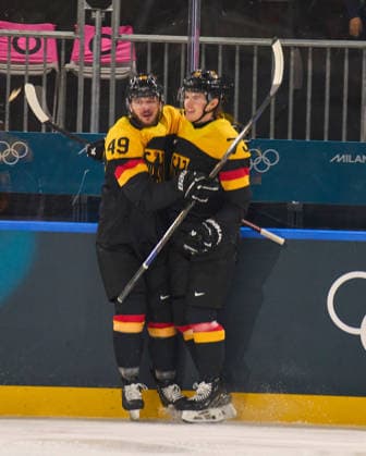 Lukas Reichel of Germany scores for 1-0 at the preliminary men Ice hockey, Eishockey match Group C Germany - Latvia of the Milano Cortina 2026 Winter Olympic Games, Olympische Spiele, Olympia, OS at Milano Rho Ice Hockey Arena on February 14, 2026 in Milan, Italy.