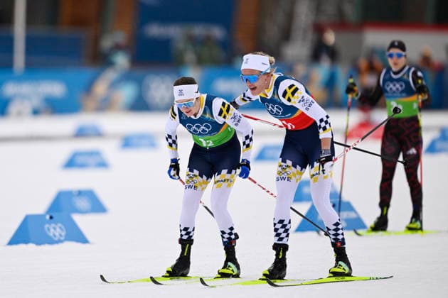 VAL DI FIEMME, ITALY 20260214 Sweden s Ebba Andersson and Linn Svahn take turns in the women s 4 x 7.5 km relay during the Winter Olympics at the Tesero cross-country skiing stadium in Val di Fiemme, Italy. *** The image is included in the SPORTS PACKAGE. For others PAYMENT IMAGE *** VAL DI FIEMME ITALY x10430x *** VAL DI FIEMME, ITALY 20260214 Sweden s Ebba Andersson and Linn Svahn take turns in the women s 4 x 7 5 km relay during the Winter Olympics at the Tesero cross country skiing stadium in Val di Fiemme, Italy The image is included in the SPORTS PACKAGE For others PAYMENT IMAGE VAL DI FIEMME ITALY x10430x  Copyright: xChristinexOlsson TTx OS 2026 SKIDOR STAFETT DAM