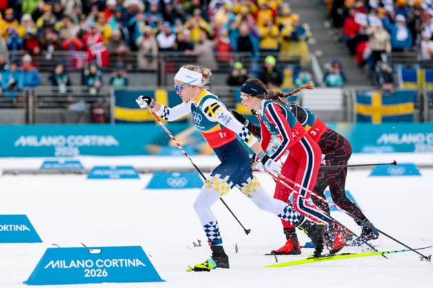OLYMPICS - Winter Olympic Games, Olympische Spiele, Olympia, OS Milano Cortina 2026 TESERO,ITALY,14.FEB.26 - OLYMPICS, NORDIC SKIING, CROSS COUNTRY SKIING - Winter Olympic Games Milano Cortina 2026, 4X7.5km relay, women, medal ceremony. Image shows Linn Svahn (SWE) and Kristin Austgulen Fosnaes (NOR).  GEPAxpictures xMatthiasxTrinkl
