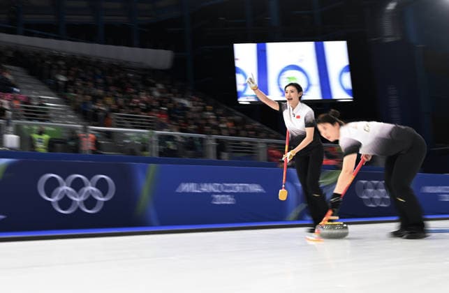 (260214) -- CORTINA D AMPEZZO, Feb. 14, 2026 -- Jiang Jiayi (L) and Dong Ziqi of China competes during the curling women round robin session 4 match between China and Italy at the 2026 Milan-Cortina Winter Olympics in Cortina, Italy, Feb. 14, 2026. ) (MICO2026)ITALY-CORTINA D AMPEZZO-OLYMPIC Winter games, Winterspiele,Spiele, Summer games CURLING-WOMEN-ROUND ROBIN-CHN VS ITA LianxYi 