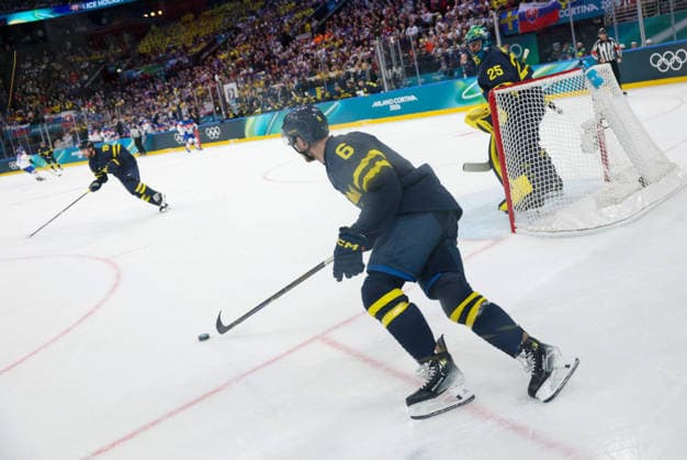 Winter Olympics - Men s Ice hockey, Eishockey - Sweden v Slovakia Philip Broberg (6) of Sweden Jacob Markstrom (25) of Sweden d during the men s ice hockey game between Sweden and Slovakia d during the 2026 Winter Olympics on February 14, 2026 in Milan, Italy. Photo by Alexis Jumeau ABACAPRESS.COM Milan Italy  Copyright: xJumeauxAlexis ABACAx