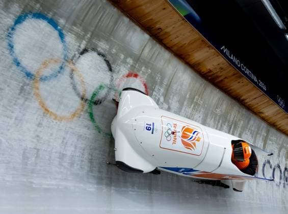 CORTINA - Dave Wesselink and Jelen Franjic training for the two-man bobsleigh event at the Milan Olympics. IRIS VAN DEN BROEK ANP xVIxANPxSportx xxANPxIVx 550668537 originalFilename: 550668537.jpg