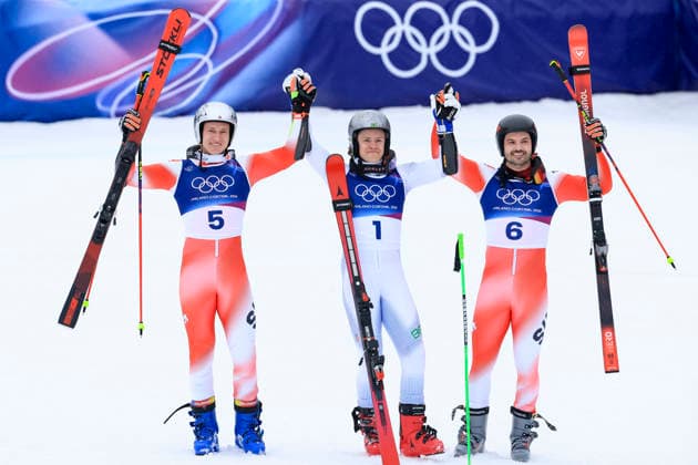 OLYMPICS - Winter Olympic Games, Olympische Spiele, Olympia, OS Milano Cortina 2026 BORMIO,ITALY,14.FEB.26 - OLYMPICS, ALPINE SKIING - Winter Olympic Games Milano Cortina 2026, giant slalom, men. Image shows the rejoicing of Marco Odermatt (SUI), Lucas Pinheiro Braathen (BRA) and Loic Meillard (SUI).  GEPAxpictures xWolfgangxGrebien