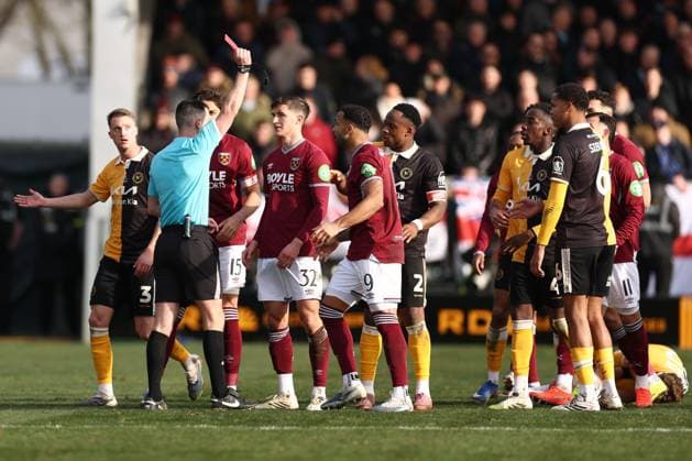 Referee Mr Lewis Smith gives Freddie Potts of West Ham United a red card and he leaves the field Burton Albion v West Ham United, Emirates FA Cup, Fourth Round, Football, Pirelli Stadium, Burton upon Trent, UK - 14 Feb 2026Burton upon Trent Pirelli Stadium United Kingdom EDITORIAL USE ONLY No use with unauthorised audio, video, data, fixture lists, club league logos or live services. Online in-match use limited to 120 images, no video emulation. No use in betting, games or single club league player publications. Copyright: xRyanxBrowne Shutterstockx 16608141az