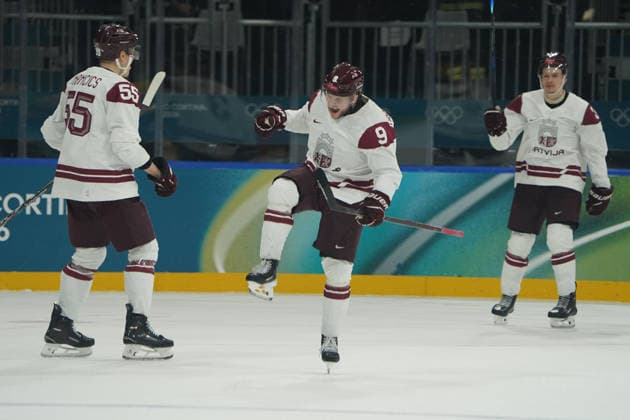 Milano Cortina, 2026 , Winter Olympic Games, Olympische Spiele, Olympia, OS Olympische , Winter-Olympische spiele 2026 , Icehockey, Eishockey Männer, Men s Preliminary Round, Vorrunde, Deutschland vs Lettland Germany vs Latvia Hockey Arena Rho Milano Mailand Lettland, Renars Kratenbergs Latvia, LAT jubelt Photocopyright Gladys Chai von der Laage *** Milano Cortina, 2026 , Winter Olympic Games, Olympic , Winter Olympic Games 2026 , Icehockey, Icehockey Men, Men s Preliminary Round, Preliminary Round, Germany vs Latvia Germany vs Latvia Hockey Arena Rho Milano Milan Latvia, Renars Kratenbergs Latvia, LAT cheers Photocopyright Gladys Chai von der Laage