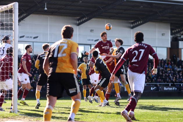 Burton Albion v West Ham Utd. Charlotte Wilson Offside.14 February 2026, Burton - Emirates FA Cup, Fourth Round - Burton Albion v West Ham United - Konstantinos Mavropanos of West Ham United heads the ball - Photo: Charlotte Wilson Offside. Burton-upon-Trent UK Copyright: xCharlottexWilsonx xOffsidexOffside
