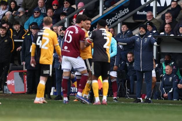 Burton Albion and West Ham players clash as Nuno Espirito Santo Manager of West Ham United reacts. Burton Albion v West Ham United, Emirates FA Cup, Fourth Round, Football, Pirelli Stadium, Burton upon Trent, UK - 14 Feb 2026Burton upon Trent Pirelli Stadium United Kingdom EDITORIAL USE ONLY No use with unauthorised audio, video, data, fixture lists, club league logos or live services. Online in-match use limited to 120 images, no video emulation. No use in betting, games or single club league player publications. Copyright: xRyanxBrowne Shutterstockx 16608141bn