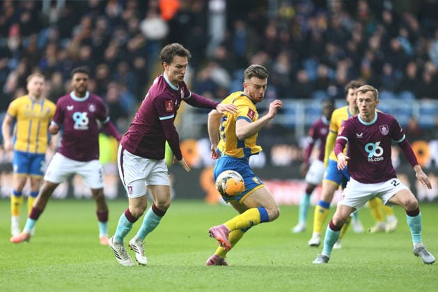 Hjalmar Ekdal of Burnley and Rhys Oates of Mansfield Town Burnley v Mansfield Town, Emirates FA Cup, Fourth Round, Football, Turf Moor, Burnley, UK - 14 Feb 2026Burnley Turf Moor United Kingdom EDITORIAL USE ONLY No use with unauthorised audio, video, data, fixture lists, club league logos or live services. Online in-match use limited to 120 images, no video emulation. No use in betting, games or single club league player publications. Copyright: xPhilxOldham Shutterstockx 16608267l