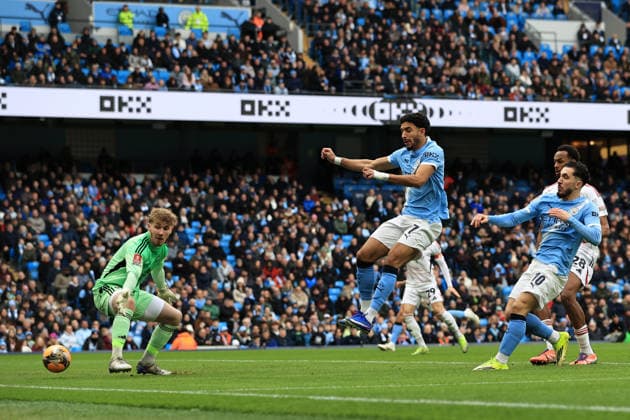 14th February 2026; Etihad Stadium, Manchester, Lancashire, England; FA Cup Football, Manchester City versus Salford City ; Omar Marmoush of Manchester City beats Salford City goalkeeper Matthew Young to score for 1-0 after 6 minutes  DavidxBlunsden Content restricted for UK based newspaper