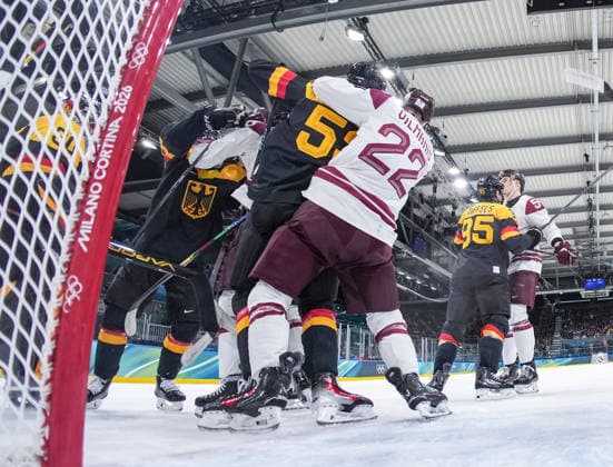 (260214) -- MILAN, Feb. 14, 2026 -- Players of both teams fight during the Ice hockey, Eishockey men s preliminary round group C match between Germany and Latvia of the Milan-Cortina 2026 Olympic Winter games, Winterspiele,Spiele, Summer games in Milan, Italy, Feb. 14, 2026. ( Pool via Xinhua) (MICO2026)ITALY-MILAN-OLYMPIC WINTER GAMES-ICE HOCKEY-MEN-PRELIMINARY-GER VS LAT SunxFei 